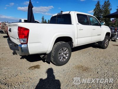 Trzecie zdjęcie samochodu z tyłu: 2017 TOYOTA TACOMA SR5 V6 VIN:3TMCZ5AN4HM049821 - miniatura