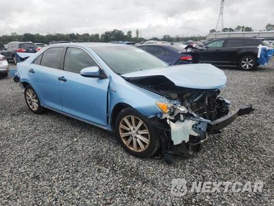 Czwarte zdjęcie samochodu z boku: 2012 TOYOTA CAMRY HYBRID XLE VIN:4T1BD1FK2CU032680 - miniatura