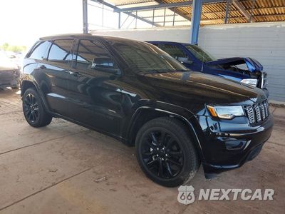 Czwarte zdjęcie samochodu z boku: 2020 JEEP GRAND CHEROKEE LAREDO VIN:1C4RJEAGXLC404777 - miniatura