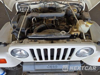 Zdjęcie 12 z 13 samochodu: 1999 JEEP WRANGLER / TJ SAHARA VIN:1J4FY49SXXP444643 - miniatura