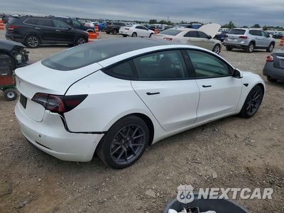 Trzecie zdjęcie samochodu z tyłu: 2021 TESLA MODEL 3 VIN:5YJ3E1EA6MF026762 - miniatura
