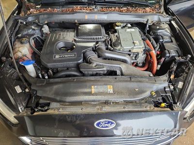 Zdjęcie 11 z 12 samochodu: 2013 FORD FUSION SE HYBRID VIN:3FA6P0LU0DR349370 - miniatura