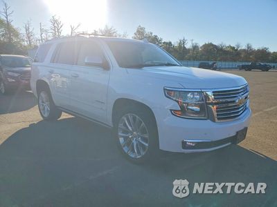 Czwarte zdjęcie samochodu z boku: 2019 CHEVROLET TAHOE K1500 PREMIER VIN:1GNSKCKJ6KR211462 - miniatura