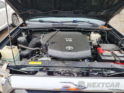 Zdjęcie 11 z 12 samochodu: 2014 TOYOTA TACOMA V6 VIN:3TMLU4EN8EM145871 - miniatura