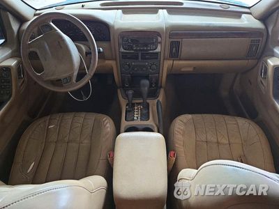 Zdjęcie 8 z 13 samochodu: 2000 JEEP GRAND CHEROKEE LIMITED VIN:1J4GW58N0YC419352 - miniatura