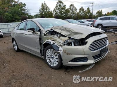 Czwarte zdjęcie samochodu z boku: 2015 FORD FUSION SE HYBRID VIN:3FA6P0LU6FR217085 - miniatura