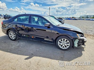 Czwarte zdjęcie samochodu z boku: 2014 VOLKSWAGEN JETTA SE VIN:3VWD17AJ1EM217430 - miniatura