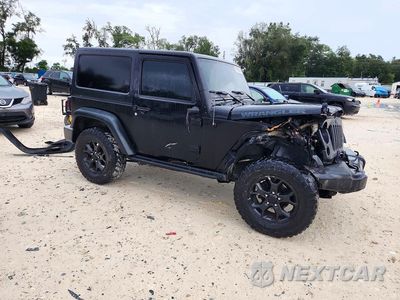 Czwarte zdjęcie samochodu z boku: 2016 JEEP WRANGLER SPORT VIN:1C4AJWAG2GL171132 - miniatura