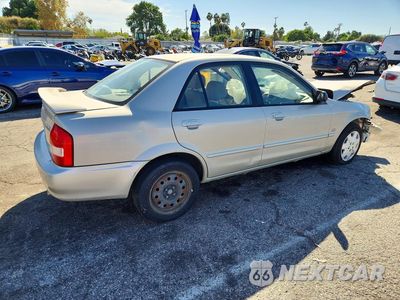 Trzecie zdjęcie samochodu z tyłu: 2001 MAZDA PROTEGE LX VIN:JM1BJ225110422483 - miniatura
