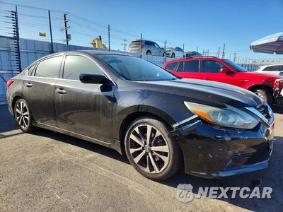 Czwarte zdjęcie samochodu z boku: 2016 NISSAN ALTIMA 2.5 SR VIN:1N4AL3AP3GC170151 - miniatura