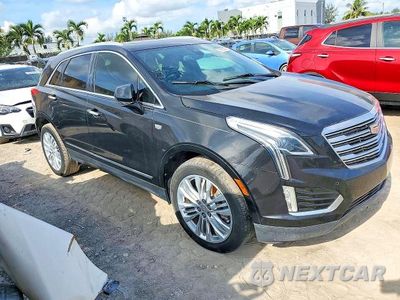 Czwarte zdjęcie samochodu z boku: 2017 CADILLAC XT5 PREMIUM LUXURY VIN:1GYKNCRS8HZ112031 - miniatura