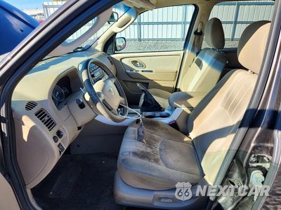 Zdjęcie 7 z 12 samochodu: 2006 MERCURY MARINER VIN:4M2CU56156KJ20060 - miniatura