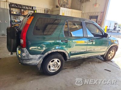 Trzecie zdjęcie samochodu z tyłu: 2003 HONDA CR-V LX VIN:JHLRD68443C006251 - miniatura