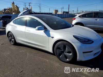 Czwarte zdjęcie samochodu z boku: 2020 TESLA MODEL 3 VIN:5YJ3E1EB4LF650051 - miniatura