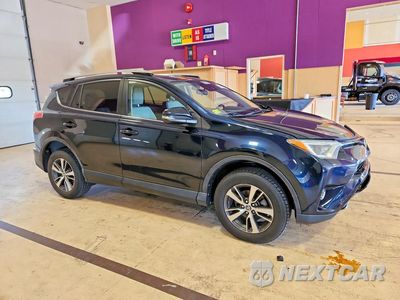 Czwarte zdjęcie samochodu z boku: 2018 TOYOTA RAV4 XLE VIN:JTMRFREV9JJ178371 - miniatura