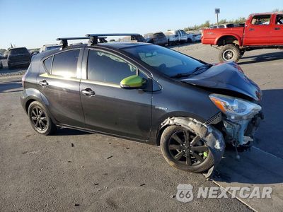 Czwarte zdjęcie samochodu z boku: 2016 TOYOTA PRIUS C PERSONA SPECIAL EDITION VIN:JTDKDTB31G1116186 - miniatura