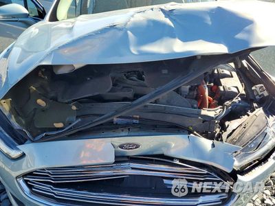 Zdjęcie 11 z 12 samochodu: 2013 FORD FUSION SE PHEV VIN:3FA6P0PUXDR233703 - miniatura