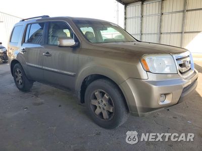 Czwarte zdjęcie samochodu z boku: 2011 HONDA PILOT TOURING VIN:5FNYF3H94BB021184 - miniatura