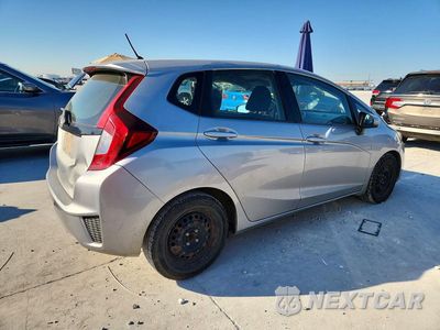 Trzecie zdjęcie samochodu z tyłu: 2017 HONDA FIT LX VIN:JHMGK5H52HS023929 - miniatura