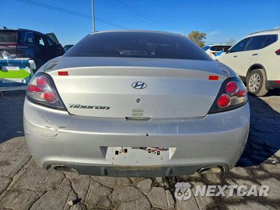 Zdjęcie 6 z 12 samochodu: 2007 HYUNDAI TIBURON GS VIN:KMHHM66DX7U261672 - miniatura
