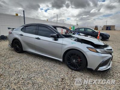 Czwarte zdjęcie samochodu z boku: 2021 TOYOTA CAMRY XSE VIN:4T1K61AK6MU429294 - miniatura