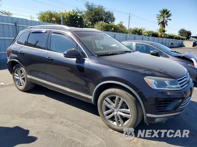 Czwarte zdjęcie samochodu z boku: 2016 VOLKSWAGEN TOUAREG TDI VIN:WVGEP9BP9GD002960 - miniatura