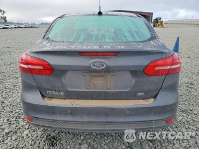 Zdjęcie 6 z 12 samochodu: 2018 FORD FOCUS SEL VIN:1FADP3H29JL261010 - miniatura