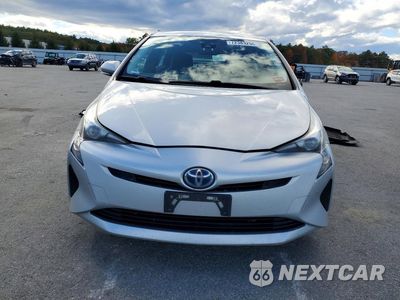 Piąte zdjęcie samochodu w środku: 2017 TOYOTA PRIUS TWO VIN:JTDKBRFU1H3042432 - miniatura
