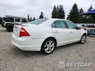 Trzecie zdjęcie samochodu z tyłu: 2012 FORD FUSION SE VIN:3FAHP0HA5CR109463 - miniatura