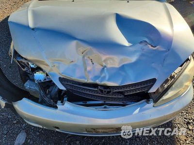 Zdjęcie 11 z 12 samochodu: 2003 TOYOTA CAMRY LE VIN:JTDBE32K730181404 - miniatura