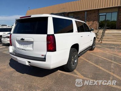 Czwarte zdjęcie samochodu z boku: 2018 CHEVROLET SUBURBAN K1500 LT VIN:1GNSKHKC1JR396954 - miniatura