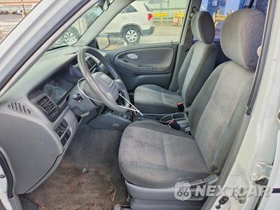Zdjęcie 7 z 13 samochodu: 2001 CHEVROLET TRACKER VIN:2CNBE13C016903775 - miniatura