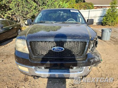Piąte zdjęcie samochodu w środku: 2004 FORD F150 SUPERCREW VIN:1FTRW14W84KB57604 - miniatura