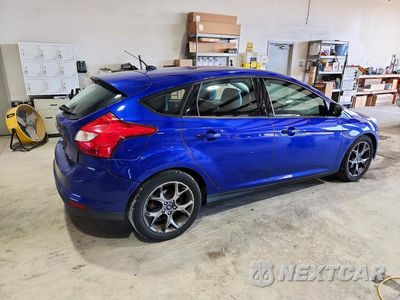 Trzecie zdjęcie samochodu z tyłu: 2013 FORD FOCUS VIN:1FADP3K21DL198451 - miniatura