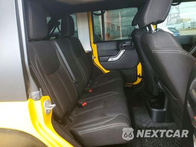Zdjęcie 10 z 12 samochodu: 2015 JEEP WRANGLER UNLIMITED RUBICON VIN:1C4BJWFG4FL659946 - miniatura