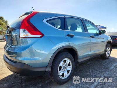 Trzecie zdjęcie samochodu z tyłu: 2014 HONDA CR-V LX VIN:2HKRM4H38EH699017 - miniatura