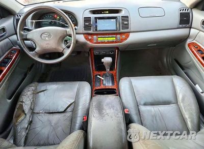 Zdjęcie 8 z 12 samochodu: 2003 TOYOTA CAMRY XLE V6 VIN:JTDBF30K730096059 - miniatura