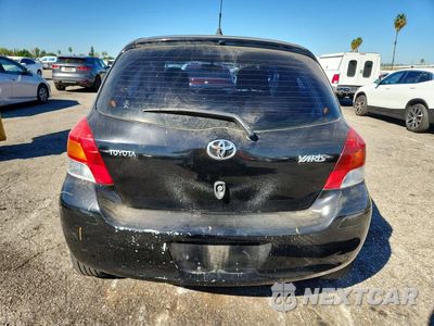 Zdjęcie 6 z 12 samochodu: 2009 TOYOTA YARIS BASE VIN:JTDJT903695276113 - miniatura