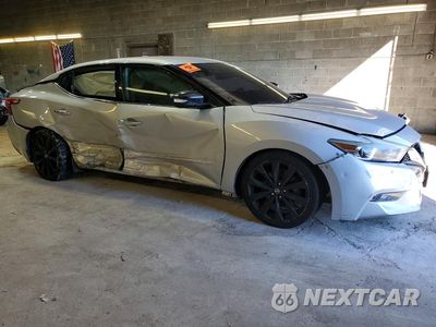 Czwarte zdjęcie samochodu z boku: 2017 NISSAN MAXIMA 3.5 SR VIN:1N4AA6AP9HC374011 - miniatura