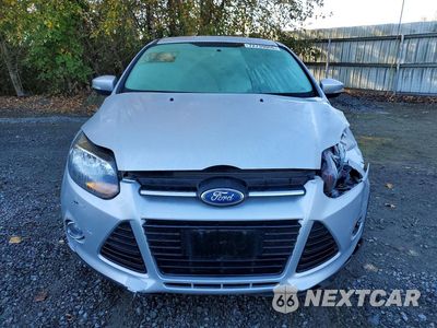 Piąte zdjęcie samochodu w środku: 2014 FORD FOCUS TITANIUM VIN:1FADP3N21EL454682 - miniatura