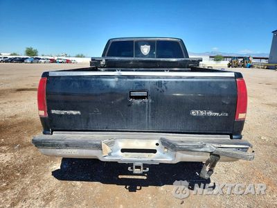 Zdjęcie 6 z 12 samochodu: 1993 GMC SIERRA 150 VIN:2GTEC19Z9P1525531 - miniatura