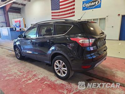 Drugie zdjęcie samochodu z przodu: 2017 FORD ESCAPE SE VIN:1FMCU9GDXHUC75115 - miniatura