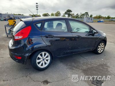 Trzecie zdjęcie samochodu z tyłu: 2013 FORD FIESTA SE VIN:3FADP4EJ3DM227133 - miniatura