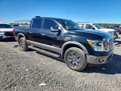 Czwarte zdjęcie samochodu z boku: 2017 NISSAN TITAN PLATINUM RESERVE VIN:1N6AA1E53HN532754 - miniatura