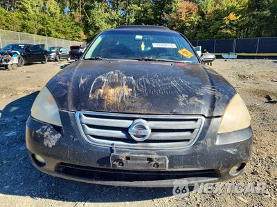 Piąte zdjęcie samochodu w środku: 2003 NISSAN ALTIMA 2.5 VIN:1N4AL11D43C319039 - miniatura
