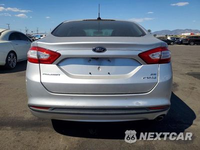 Zdjęcie 6 z 12 samochodu: 2016 FORD FUSION SE HYBRID VIN:3FA6P0LU0GR305437 - miniatura