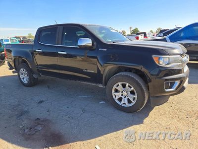 Czwarte zdjęcie samochodu z boku: 2017 CHEVROLET COLORADO LT VIN:1GCPTCE14H1234107 - miniatura