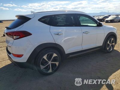 Trzecie zdjęcie samochodu z tyłu: 2016 HYUNDAI TUCSON LIMITED VIN:KM8J33A27GU119885 - miniatura