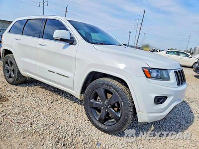 Czwarte zdjęcie samochodu z boku: 2015 JEEP GRAND CHEROKEE LAREDO VIN:1C4RJFAG3FC852384 - miniatura