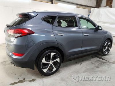 Trzecie zdjęcie samochodu z tyłu: 2016 HYUNDAI TUCSON LIMITED VIN:KM8J33A20GU111756 - miniatura
